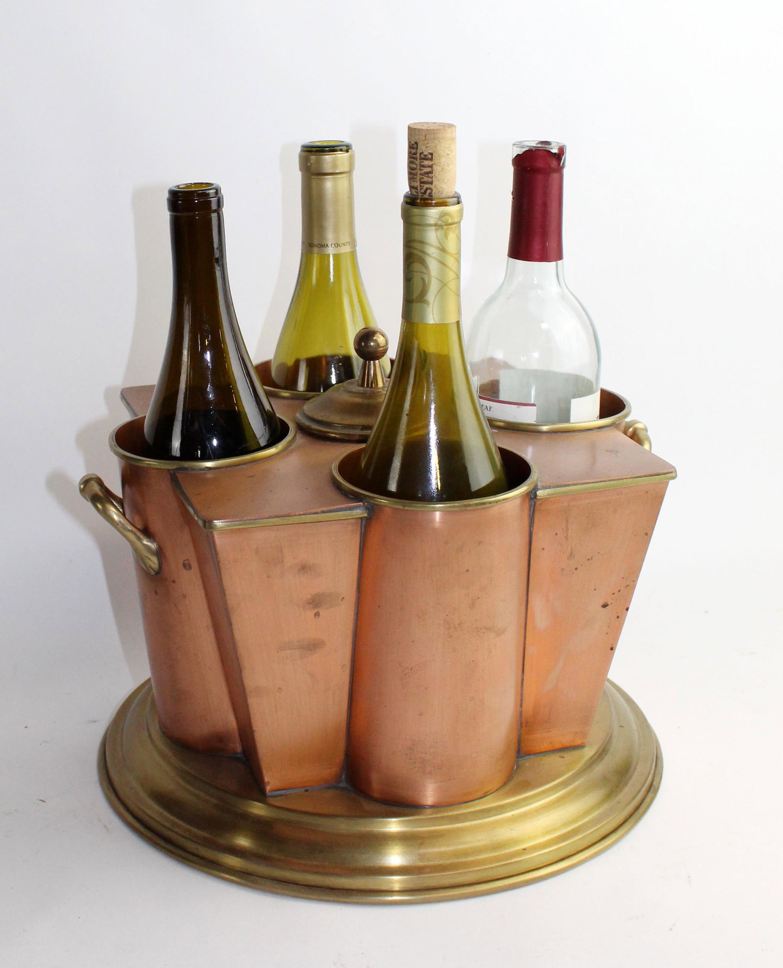 Copper 4 wine bottle cellarette: Copper 4 wine bottle cellarette. Late 20th century. Copper and brass. 10"h x 12 1/2"w