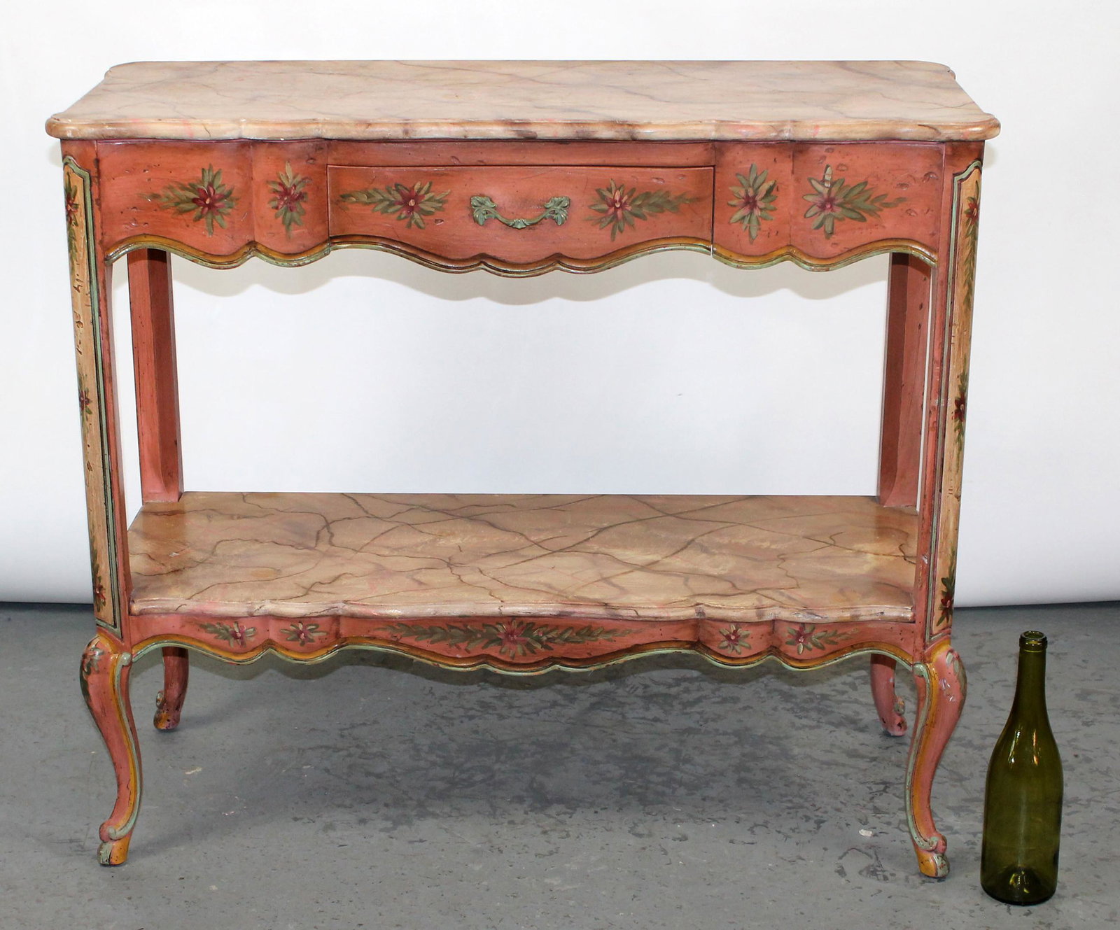 Louis XV style faux painted tiered console: Louis XV style faux painted tiered console with floral decoration. Mid 20th century. 32"h x 37"w x 14 1/2"d