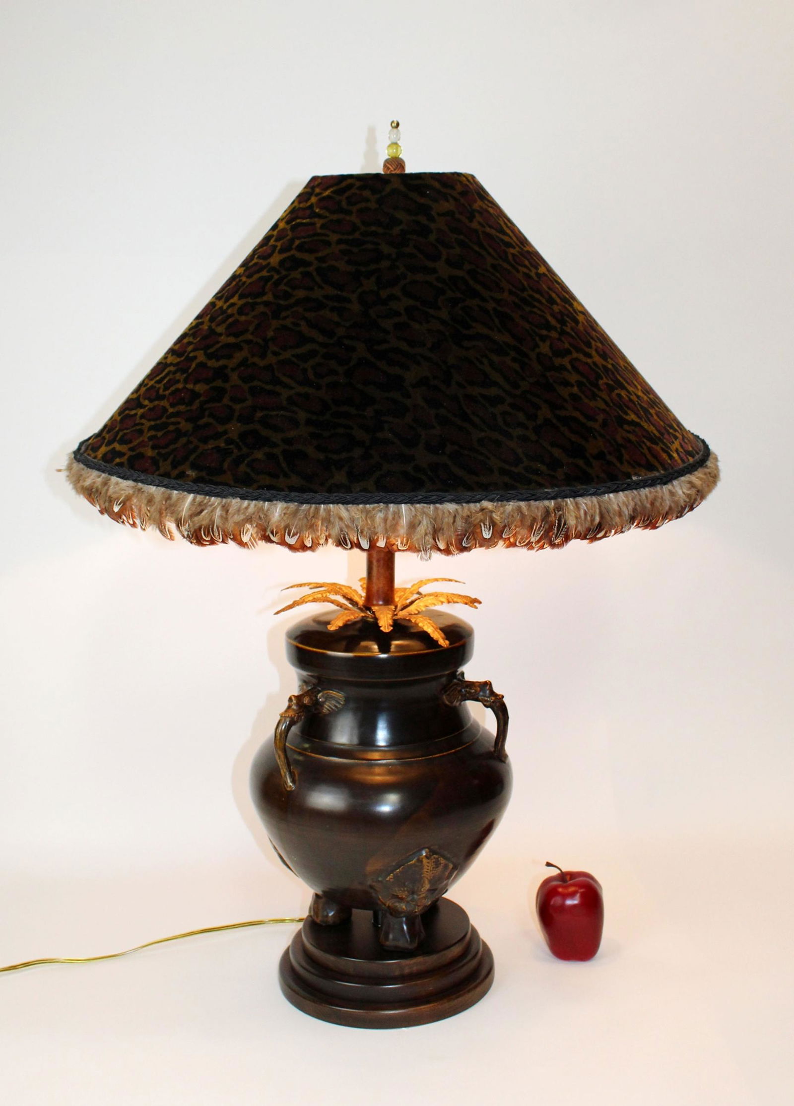 Frederick Cooper urn form lamp with elephants: Frederick Cooper urn form lamp with elephants. Feathered shade. 35"h x 25"diam (with shade), 11"diam (without shade)