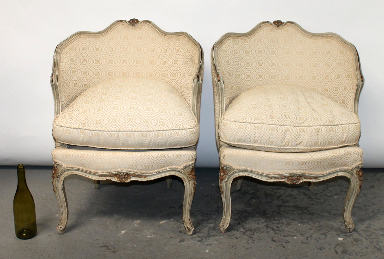 Pair French Louis XV style carved bergeres: Pair French Louis XV style bergeres in carved and painted wood. Early 20th century. 28 1/2"h x 23 1/2"w x 16"d Seats are 19"h