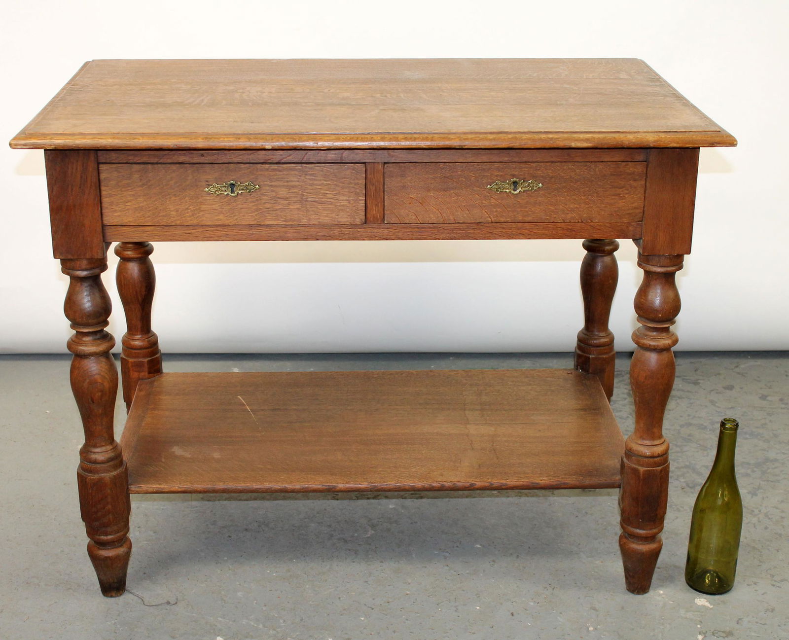 French 2 tier shop table in oak with 2 drawers and 1 side has drop leaf. (1 of 8)