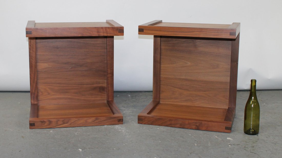 Sean Yoo Matera pair of bedside tables in walnut: Sean Yoo Matera pair of bedside tables in walnut. 22"h x 20 1/2"w x 15 1/4"d.