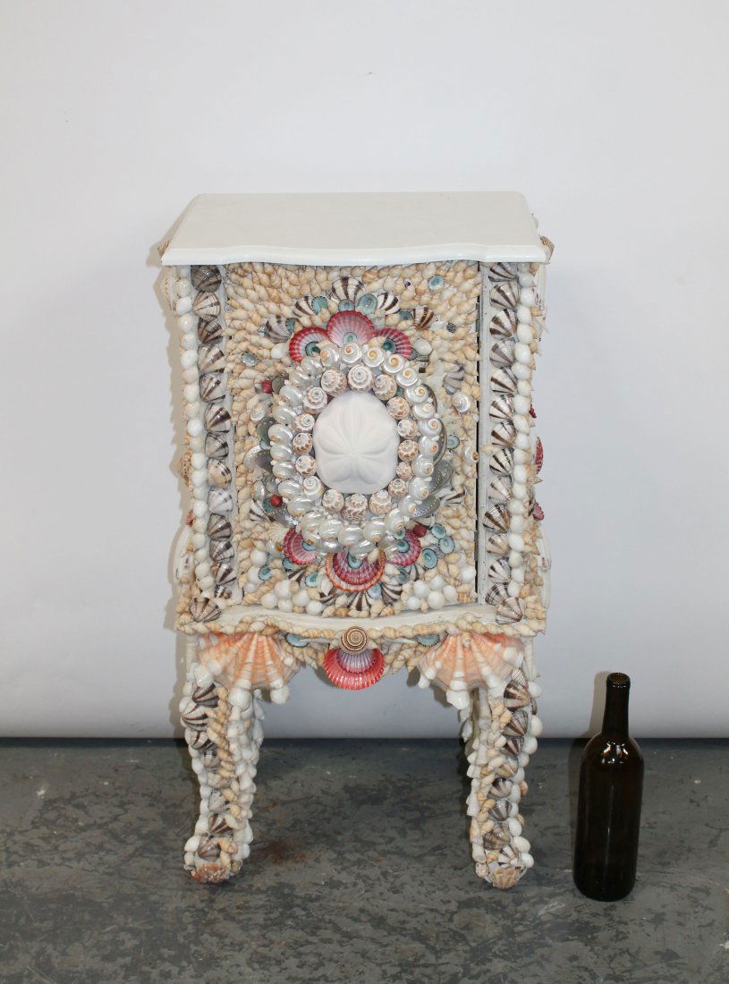Coastal sea shell covered single door cabinet on legs (1 of 9)