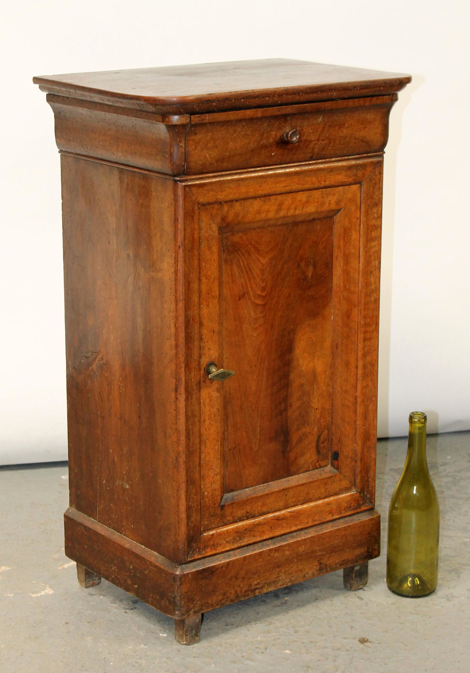 French Louis Philippe nightstand in walnut: French Louis Philippe nightstand in walnut. 32"h x 18 1/4"w x 13 1/2"d