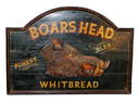 Carved wooden Boars Head Whitbread pub sign