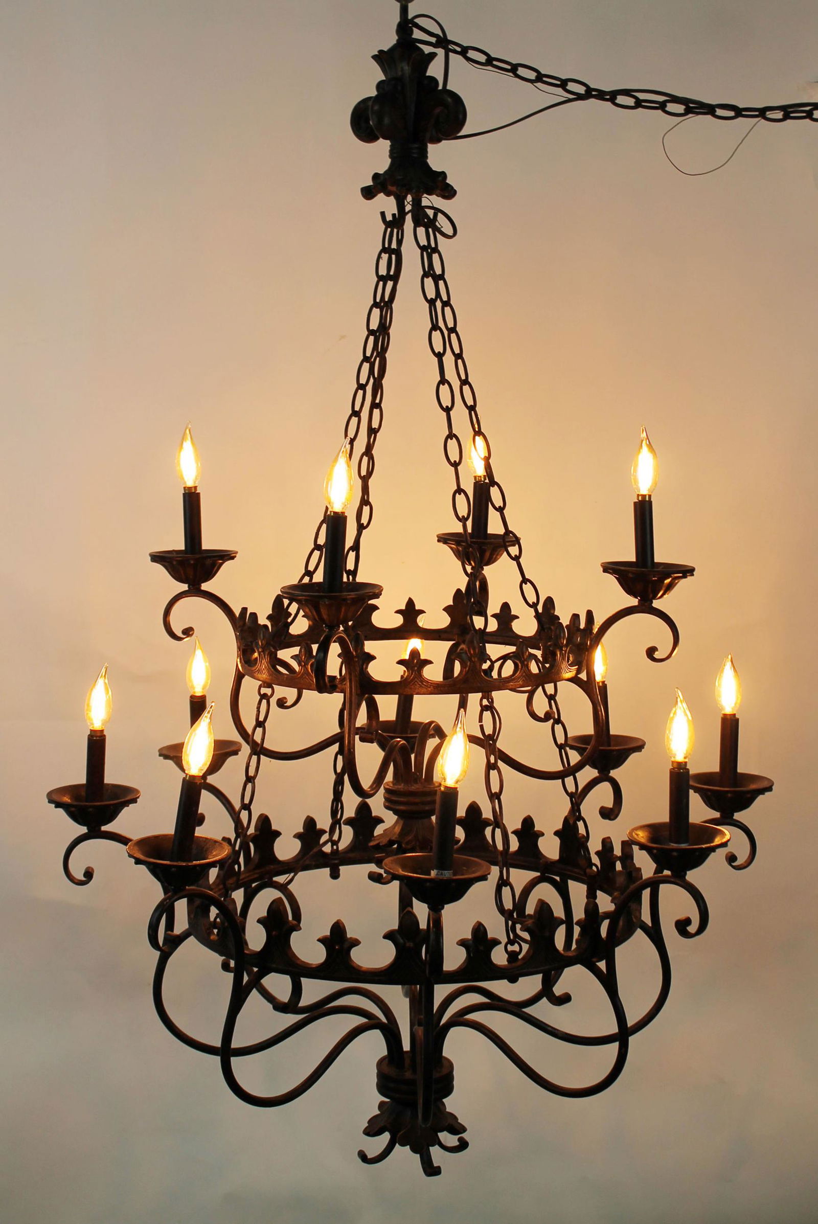 Large iron double ring chandelier with fleur de lys (1 of 16)