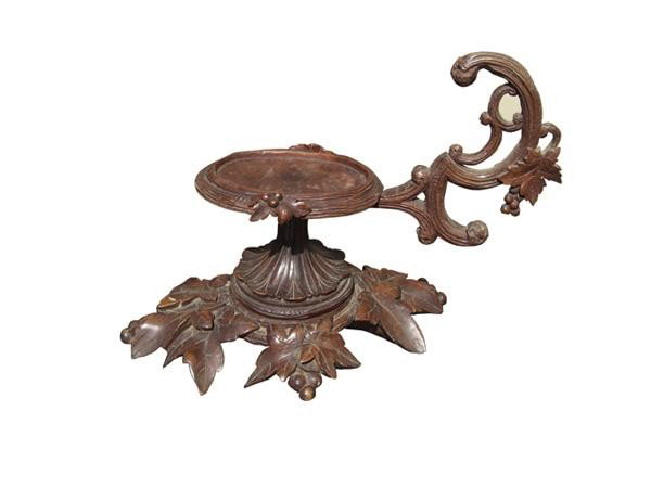 Black forest carved wine carafe stand: 12"l x 8.5"h