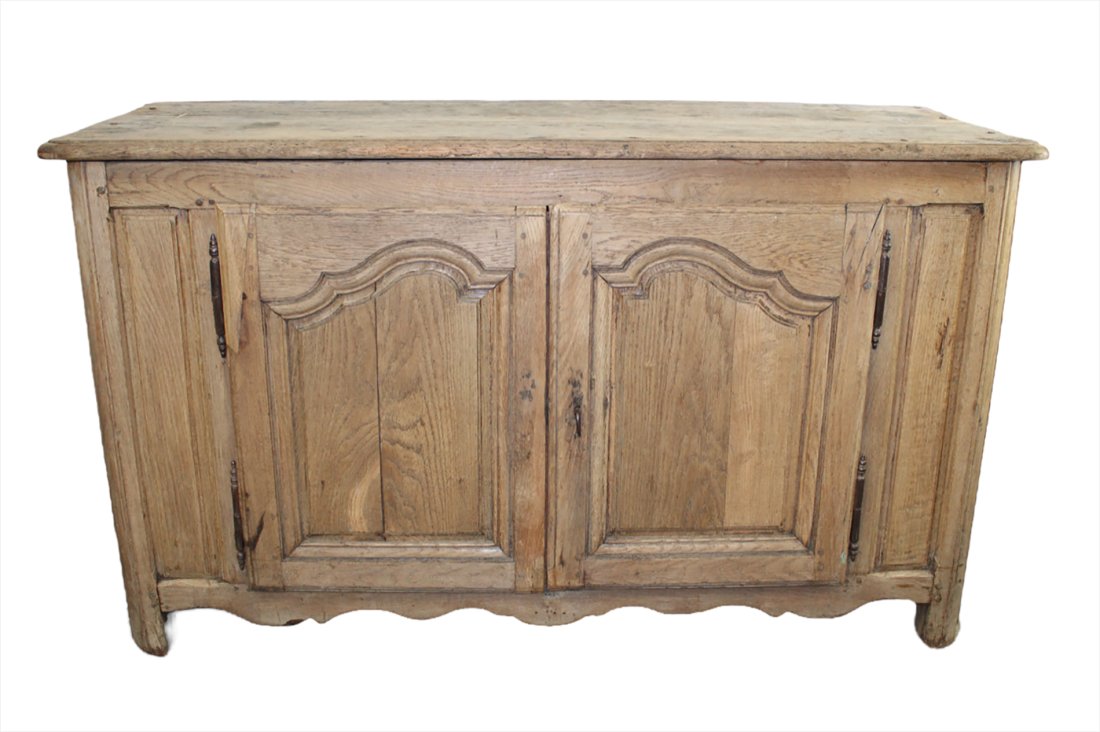 French Provincial bleached oak 2 door buffet bas: French Provincial bleached oak 2 door buffet bas. Early 19th century.33 1/2"h x 57 1/2"w x 21 1/4"d