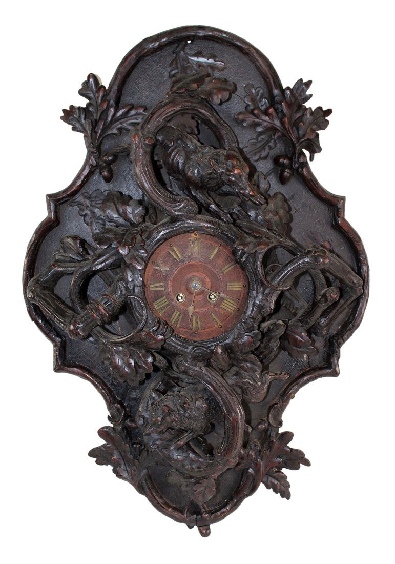 Black Forest carved wall clock with dog: Black Forest carved wall clock with hunting dog. Late 19th century. Japy Freres movement. 25 3/4"h x 17 1/4"w x 4 1/2"d