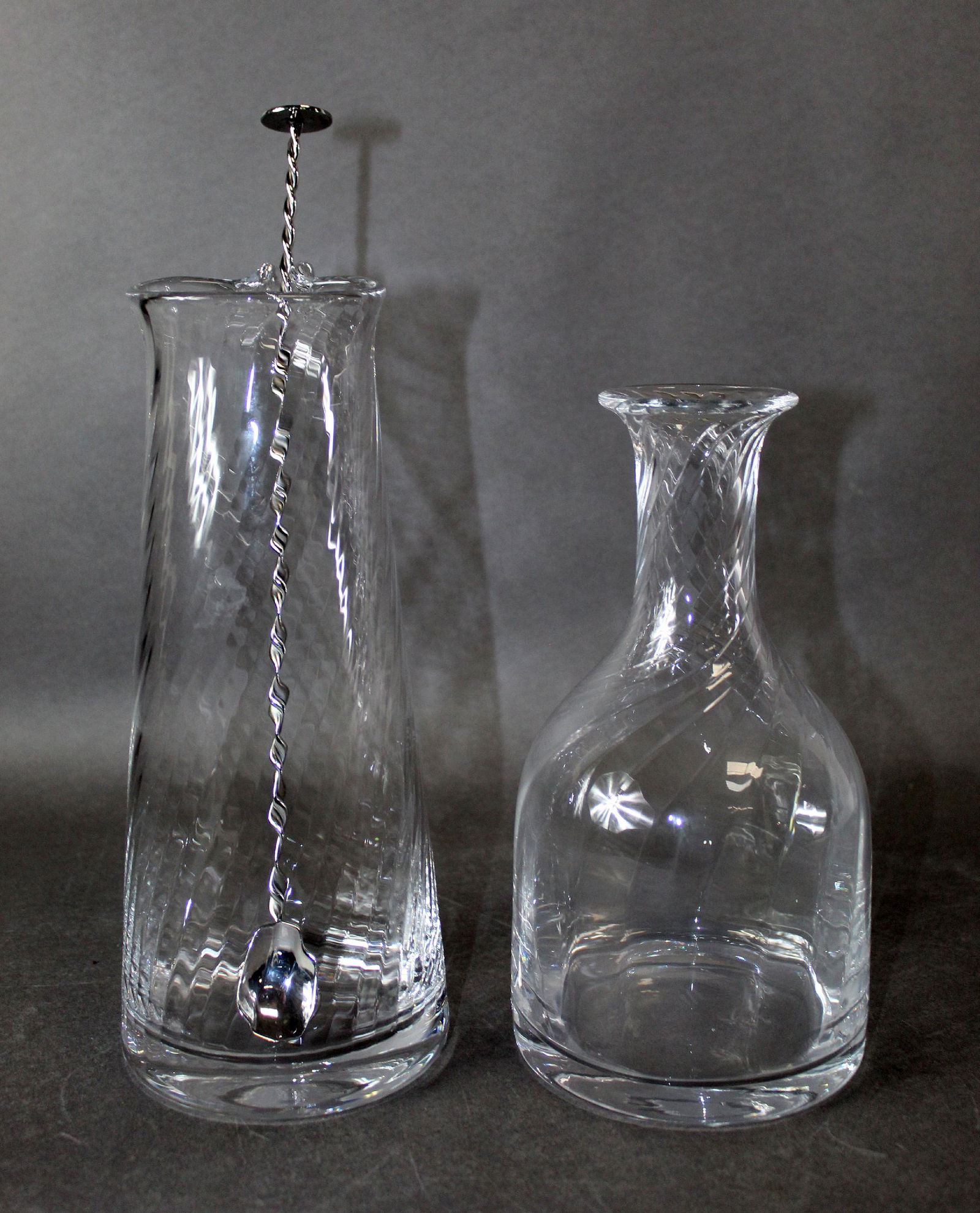 Lot of 2 pieces William Yeoward American bar crystal: Lot of 2 pieces William Yeoward American bar crystal: Dakota carafe and martini pitcher with stirrer Carafe 9 1/4"h x 5"diam, Pitcher 11"h x 4"w x 4 3/4"diam