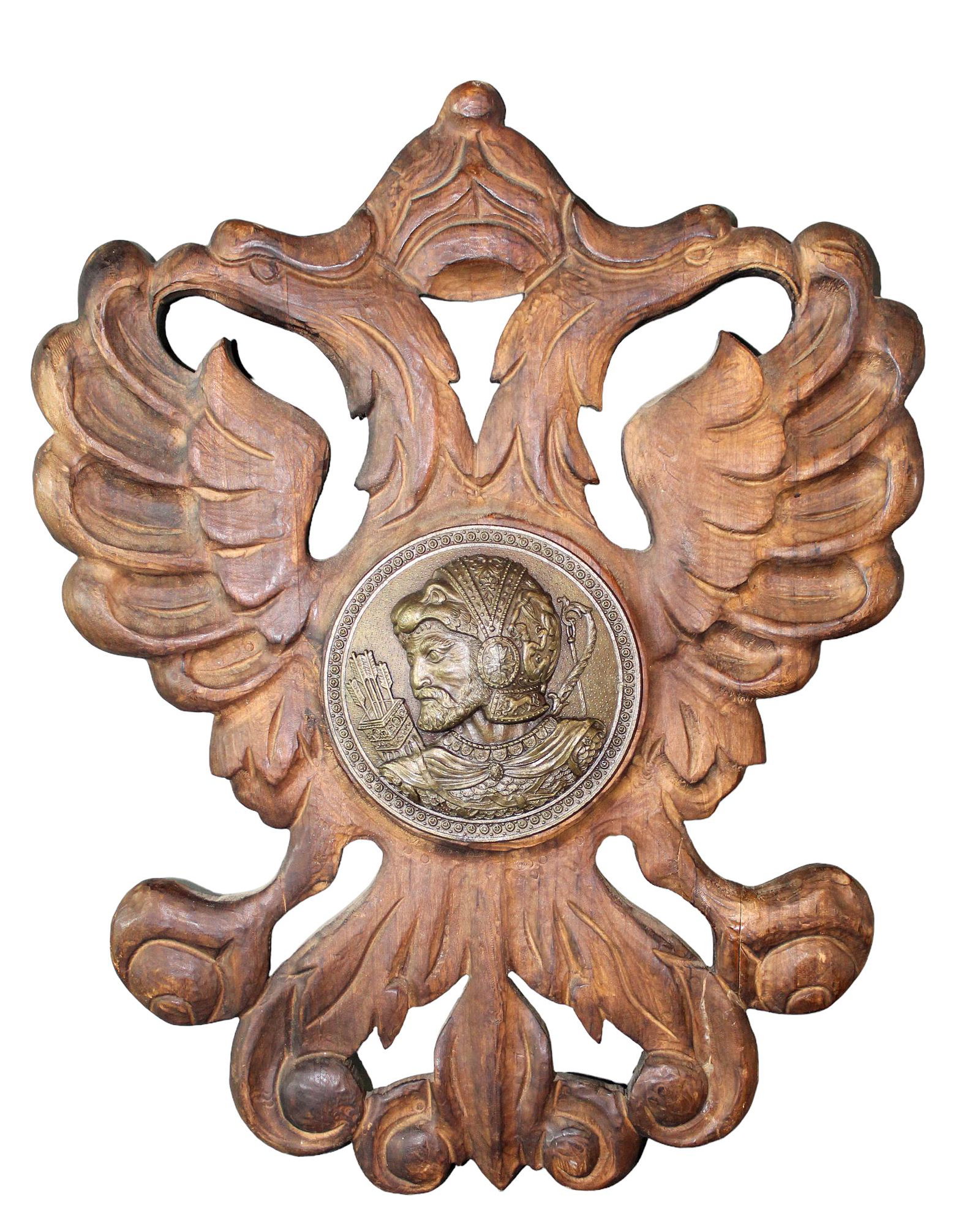 Carved oak Spanish double eagle crest with brass portrait plaque: Carved oak Spanish double eagle crest with brass portrait plaque. Mid 20th century. 18 1/4"h x 14 1/2"w x 2 3/4"d