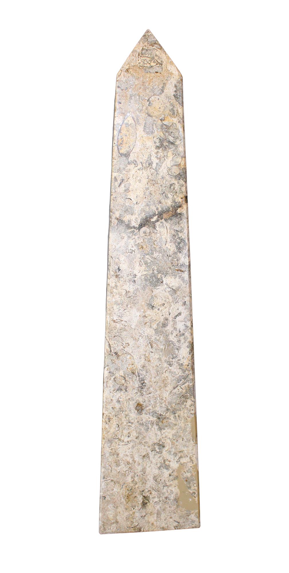 Fossilized marble obelisk: Fossilized marble obelisk. Modern. 18 1/4"h x 4 1/4"w x 3 7/8"d