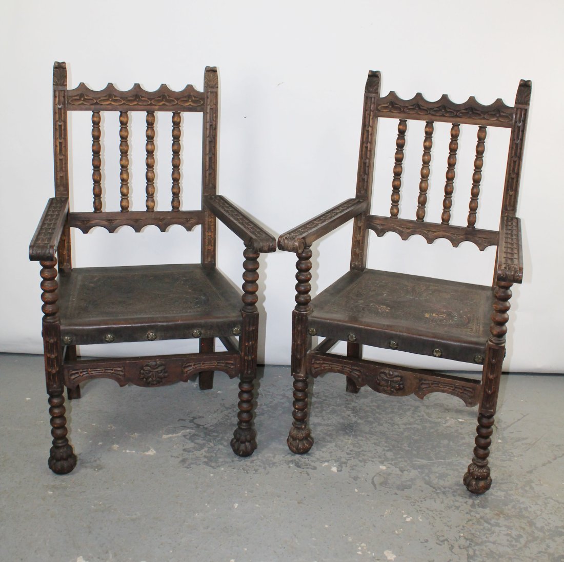 Pair of Renaissance style armchairs with tooled leather seats (1 of 10)