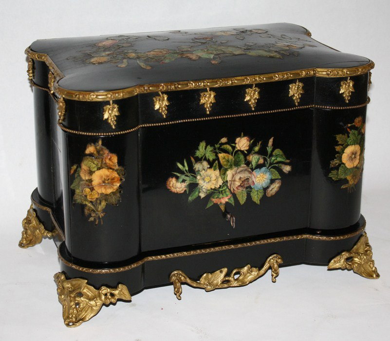 French 19th c. tantalus set in ebonized case with: floral decoration. 4 decanters, 7 glasses. Some not original to set.