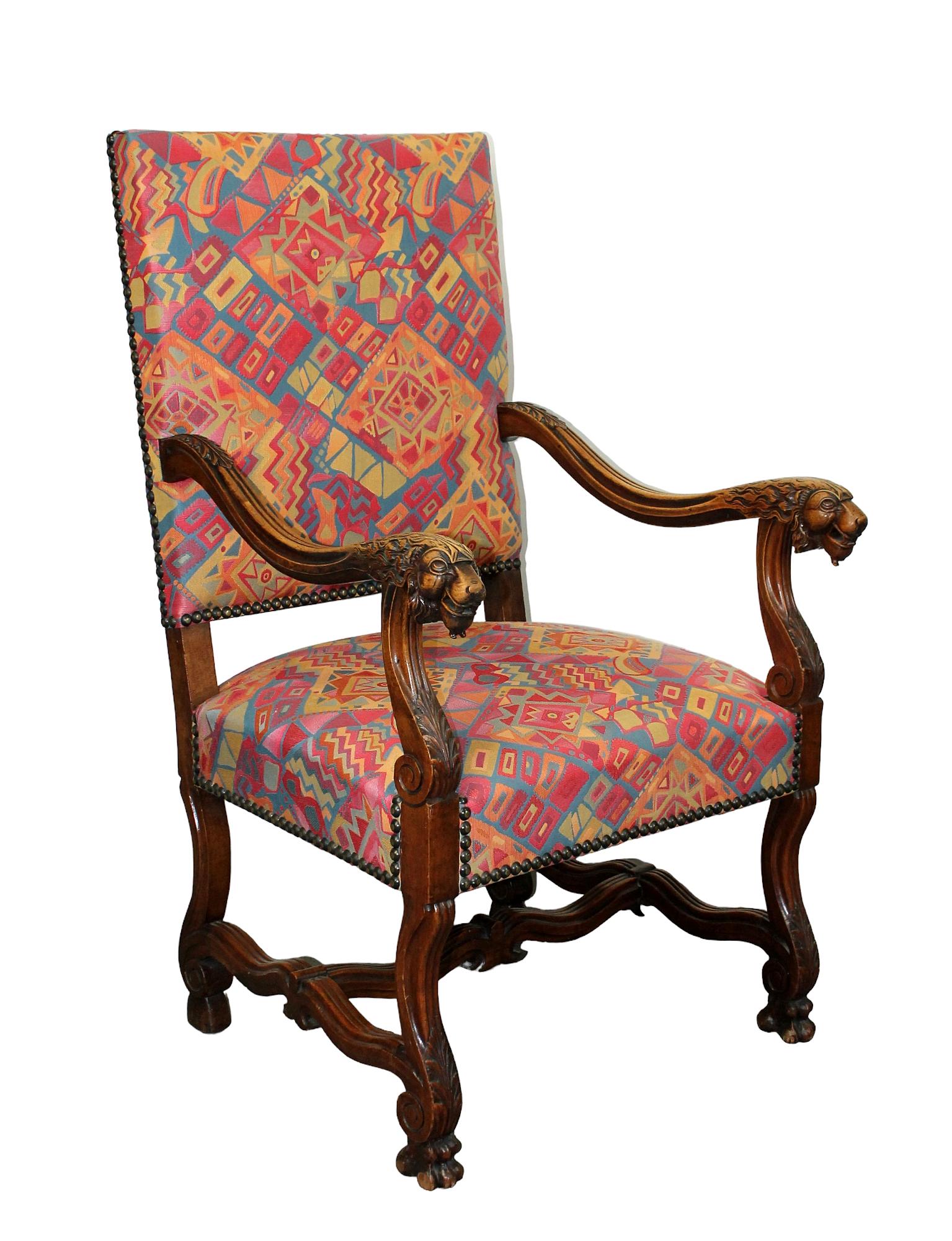 French os du mouton walnut armchair with carved lions: French os du mouton armchair in walnut with carved lion arms. Early 20th century. 45 1/2"h x 27 1/4"w x 29"d, seat height 20"