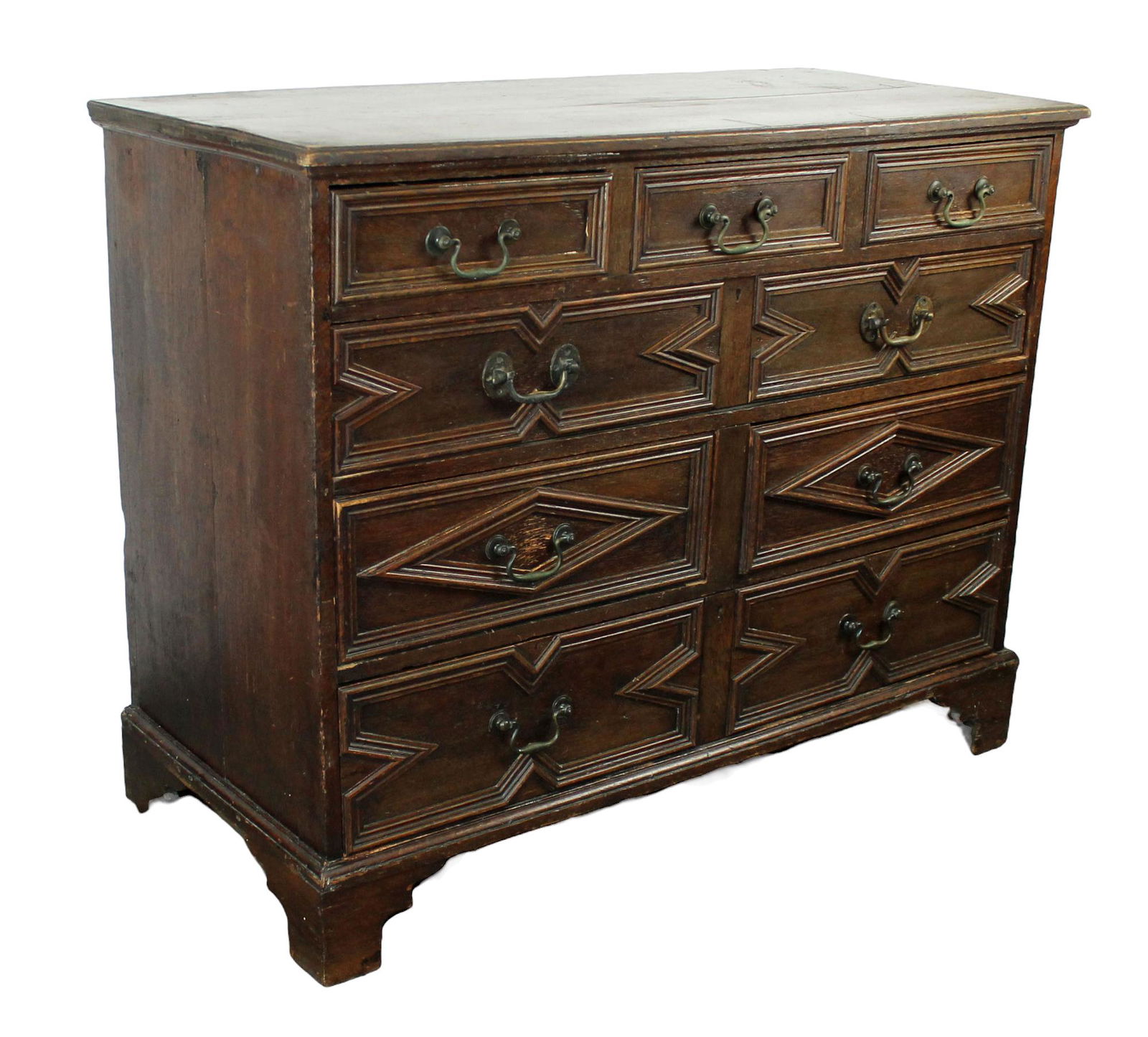 English Jacobean raised panel 3 over 3 chest of drawers in oak (1 of 9)