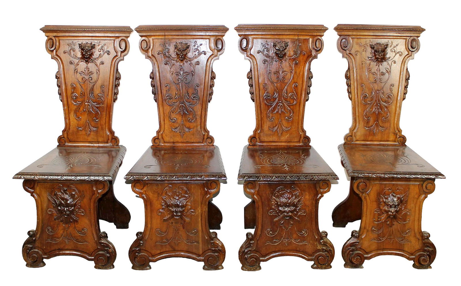Set of 4 Italian Renaissance hall chairs with relief carved faces (1 of 8)