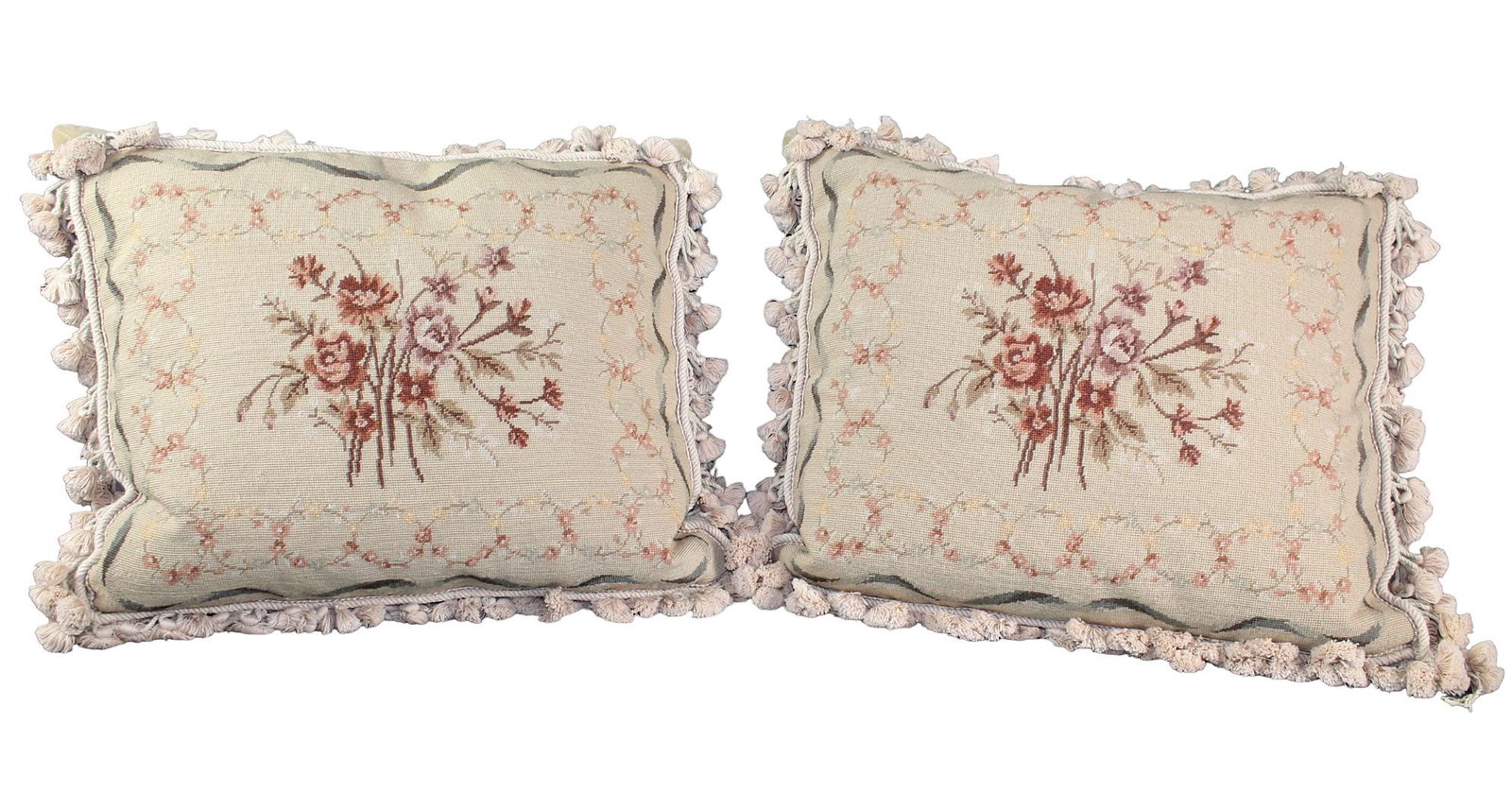 Set of 2 needlepoint pillows with flowers: Set of 2 needlepoint pillows with flowers and fringe 18" h x 18 3/4" w x 7" d (approx)