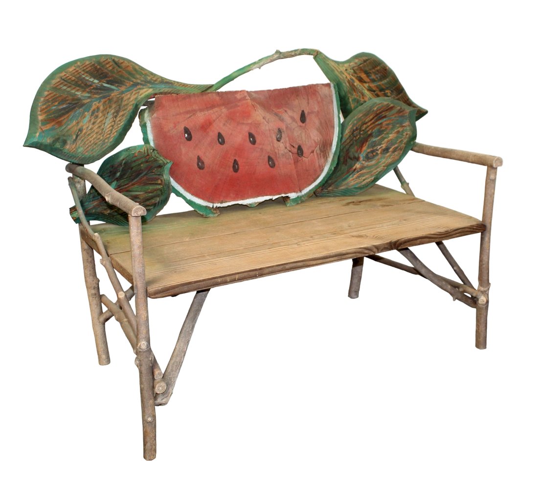 Rustic farmhouse bench with watermelon carved from tree trunk: Rustic farmhouse bench with watermelon carved and painted in relief out of a tree trunk. 36 1/2" h x 54 1/2" w x 29" d (approx) Seat height: 17 1/4"