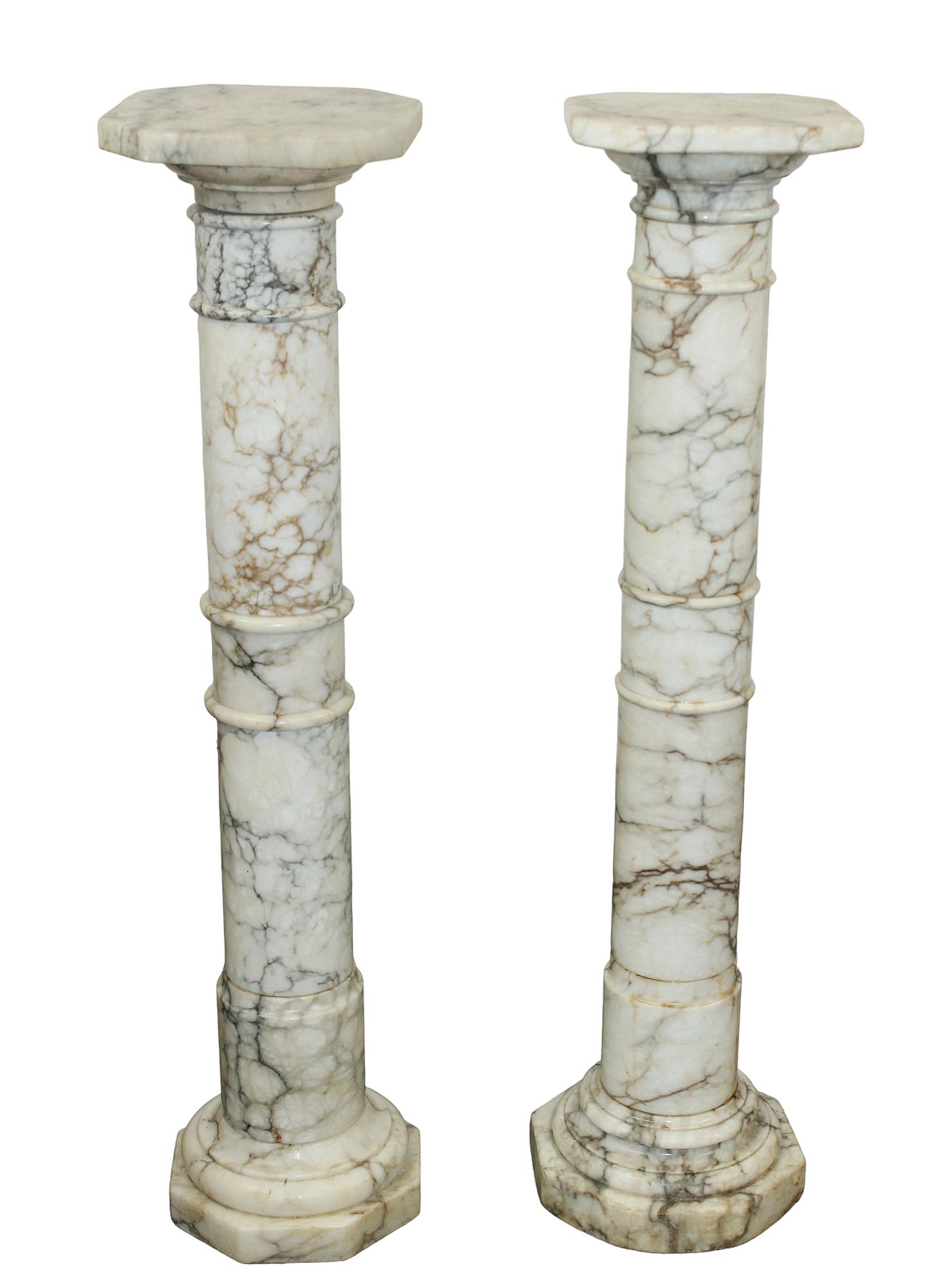Companion pair of Italian Neo-Classical alabaster pedestals: Companion pair of Italian Neo-Classical alabaster pedestals. Early 20th century. 41 1/2"x 9 1/2"w