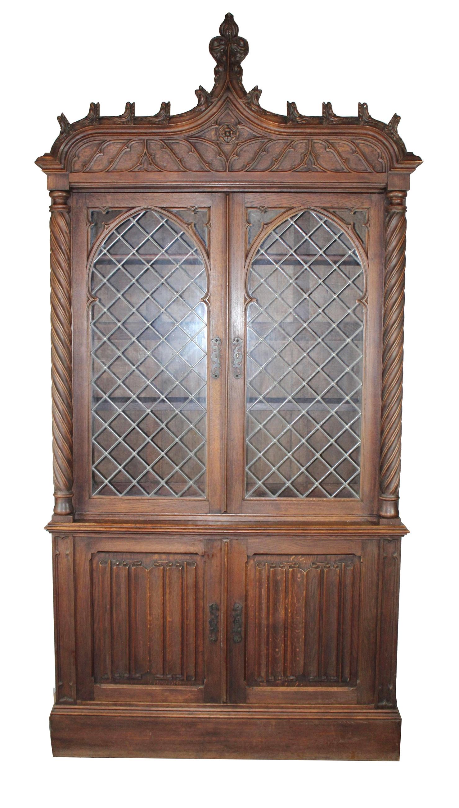 French Gothic Revival buffet in oak: French Gothic Revival buffet in oak with leaded glass doors. Late 19th century. 97 1/2"x 49"w x 17 5/8"d