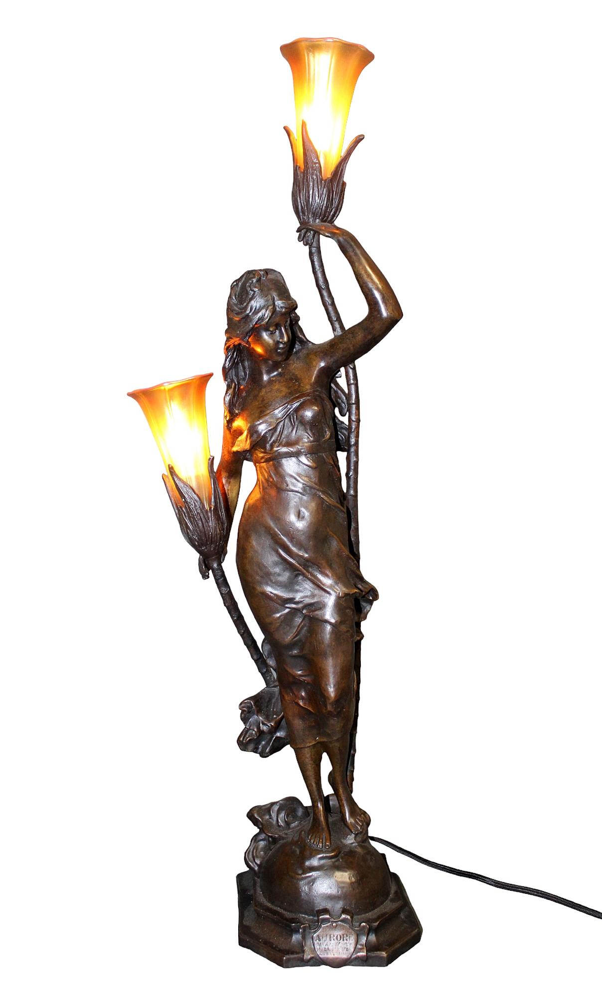 After Auguste Moreau L'Aurore 2-light bronze lady lamp: After Auguste Moreau L'Aurore (Aurora) 2-light bronze lady lamp. Mid 20th century. 28 3/4" h x 6" w x 5 1/2" d