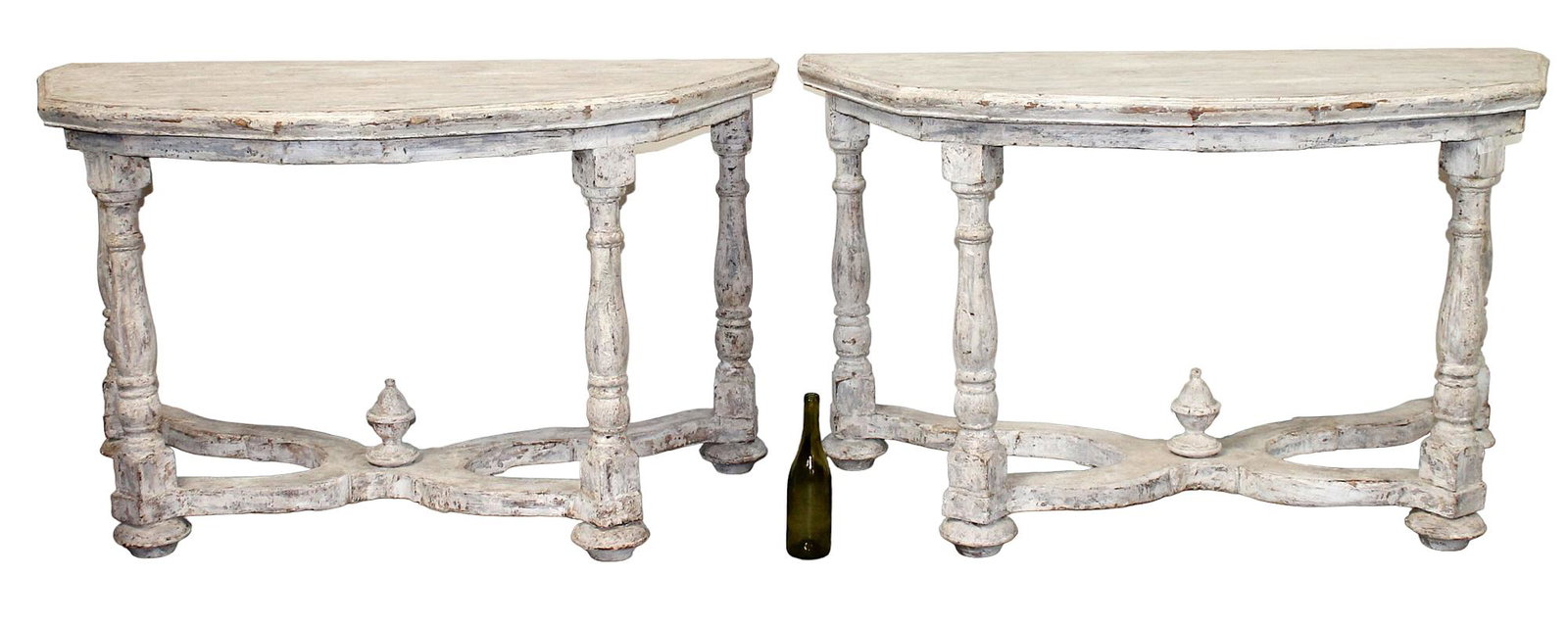 Pair Italian painted pine console tables: Pair of Italian painted console tables on turned legs with crossed stretches. 33"h x 56"w x 28 1/2"d