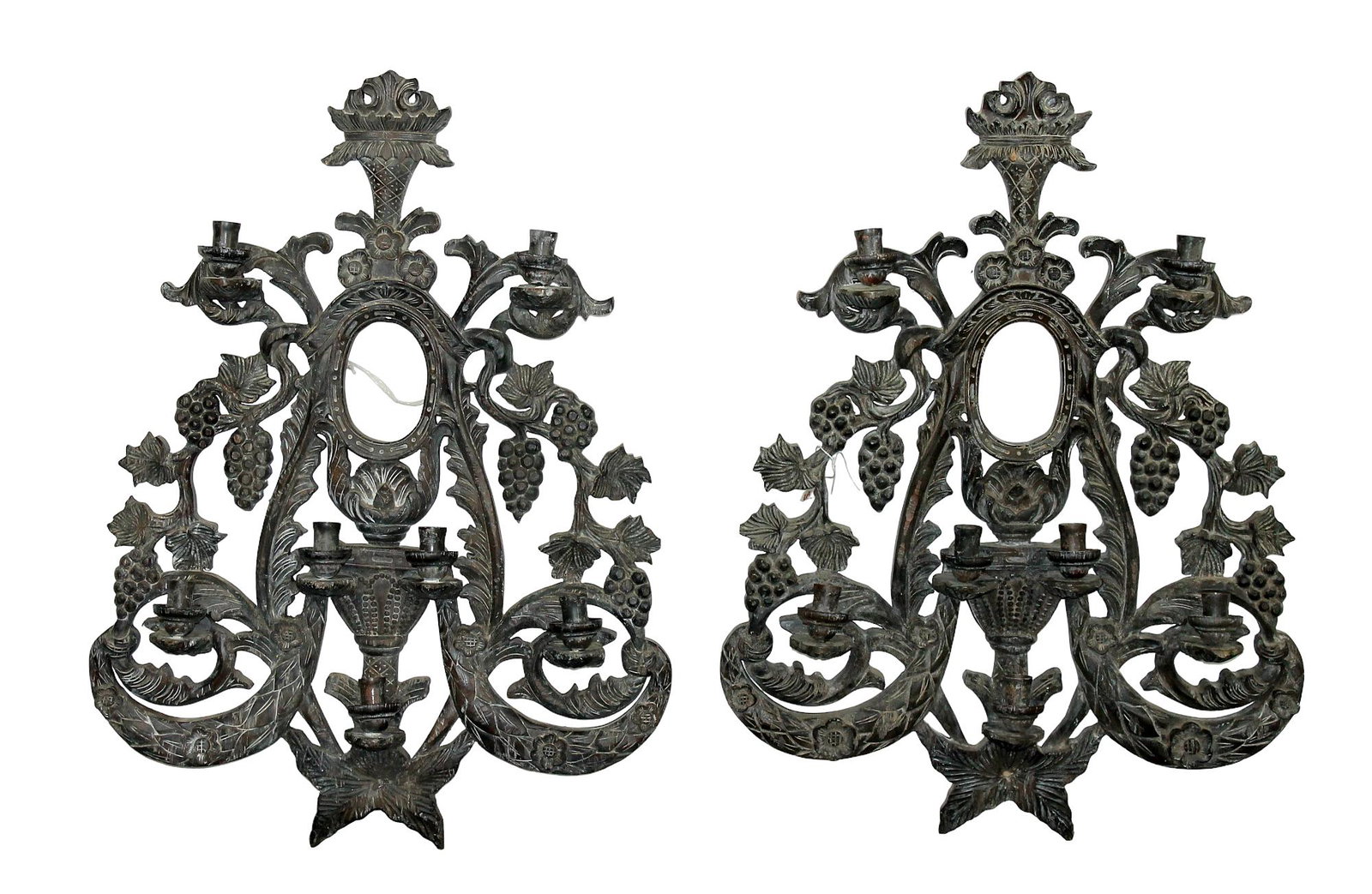 Pair of cast candle sconces with grapevine motif: Pair of cast candle sconces with grapevine motif. Made by Guildmaster. 21st century. 32"x 24"w