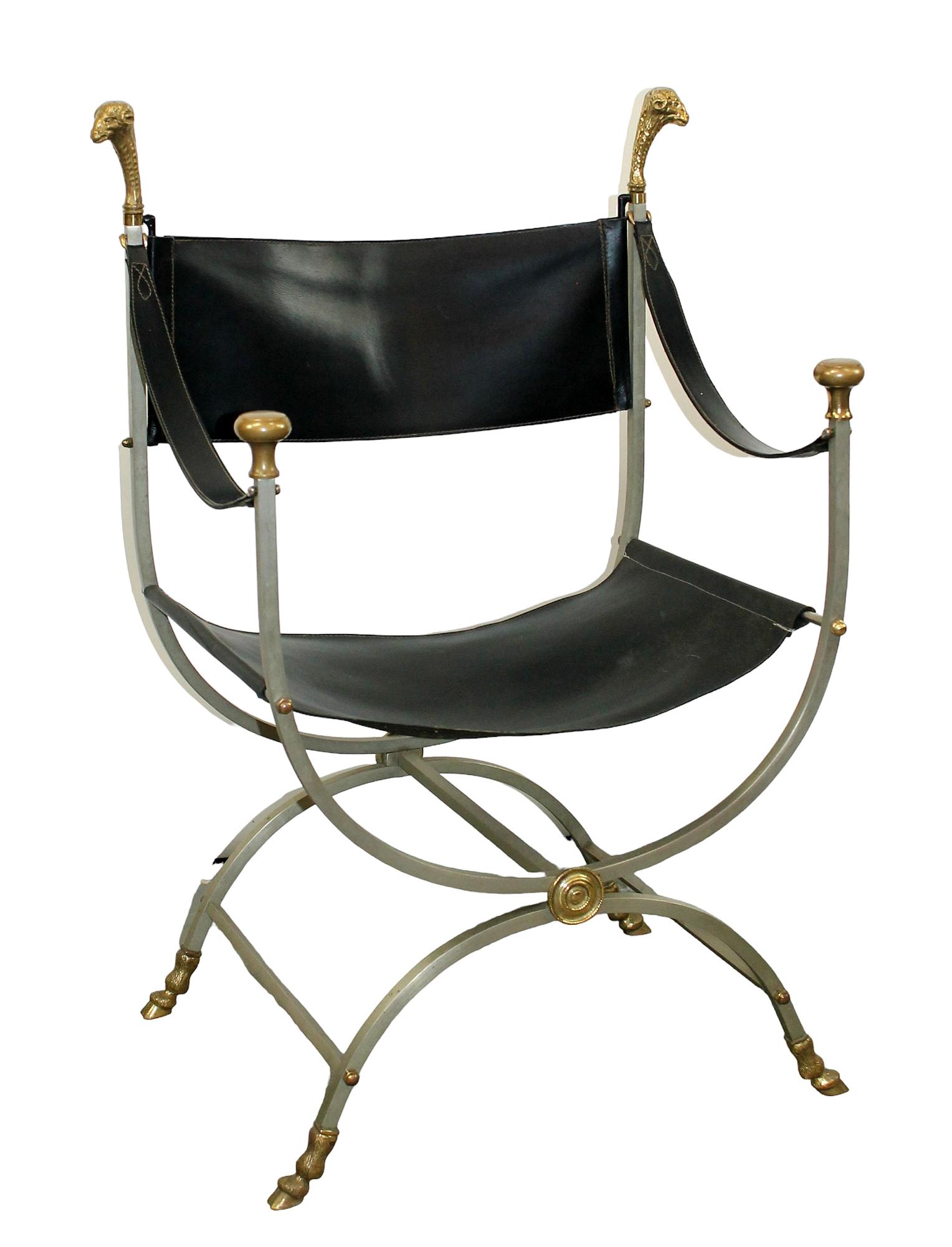 Maison Jansen steel & brass savonarola chair with rams' heads: Maison Jansen steel & brass savonarola chair with rams' heads and cloven feet. Leather seat and back. Mid 20th century. 37"h x 27 1/2"w x 18"d, seat height 16" seat height