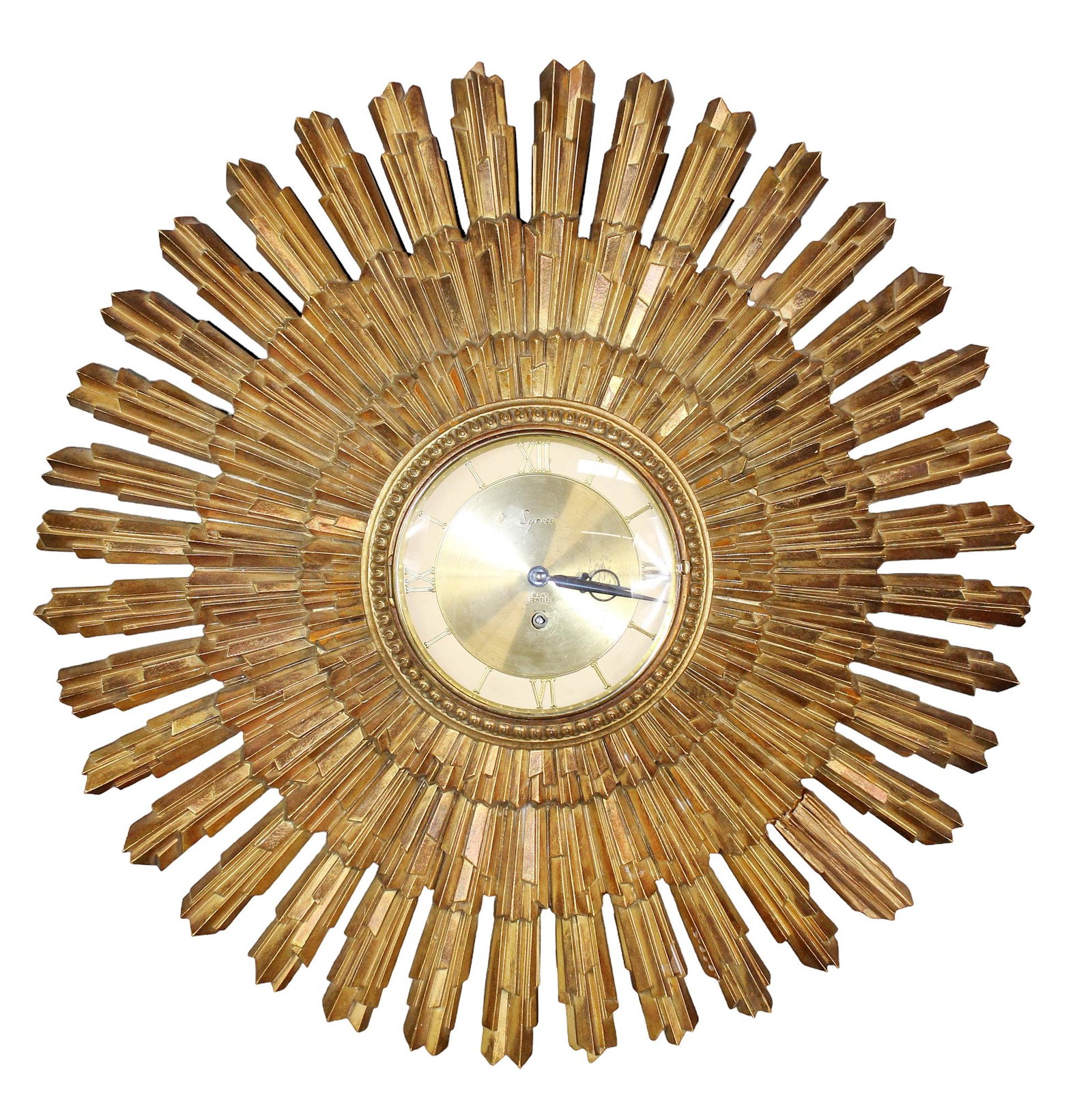 Mid century Syroco sunburst wall clock: Mid century Syroco sunburst wall clock in molded resin/polymer. Mid 20th century. 22 3/4" diam