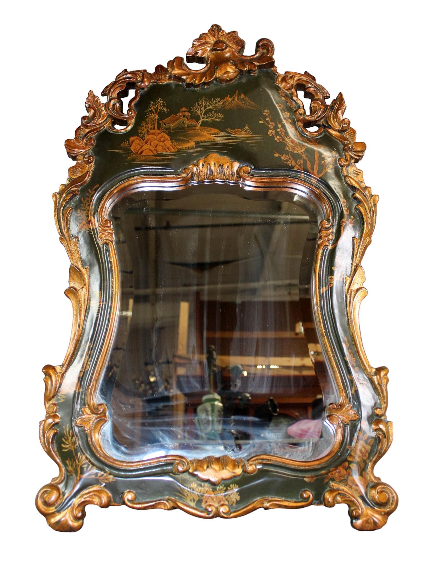 Venetian style painted shield form beveled mirror: Venetian style painted shield form mirror with beveled glass. 21st century. 30" h x 18 1/2" w