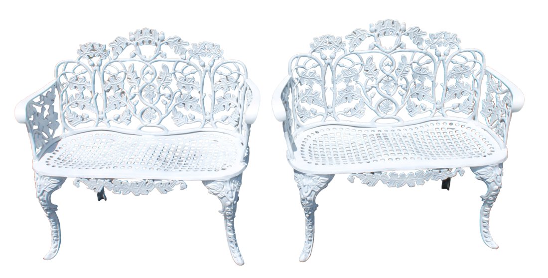 Pair of painted cast aluminum benches with ivy decoration.: Pair of painted cast aluminum benches with ivy decoration. 35"h x 40"w x 19"d, 16" seat height