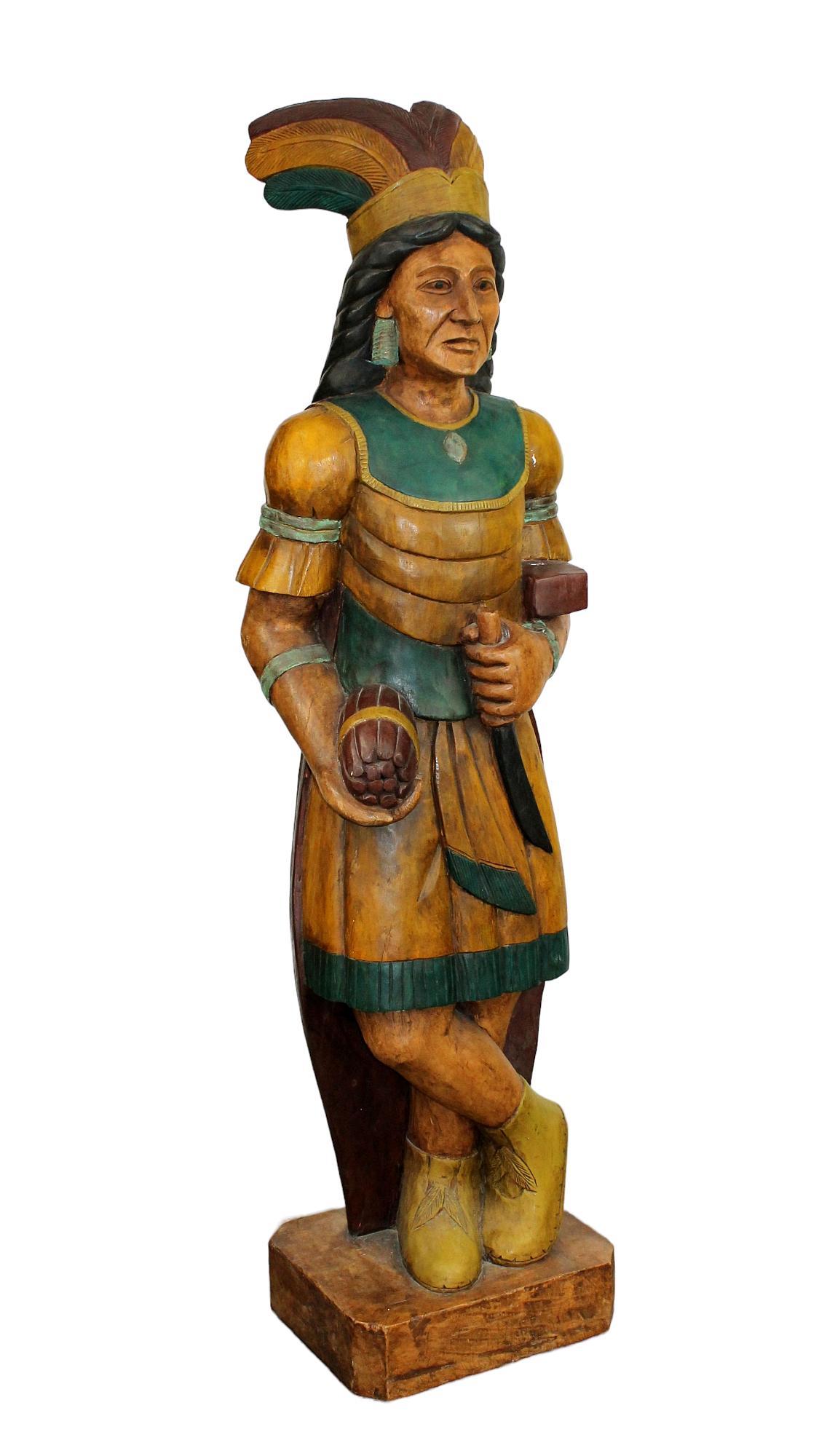 Life-size wood carving sculpture of a cigar store Indian: Life-size wood carving sculpture of a cigar store Indian. Circa 1990's. 69"h x 21"w x 14"d