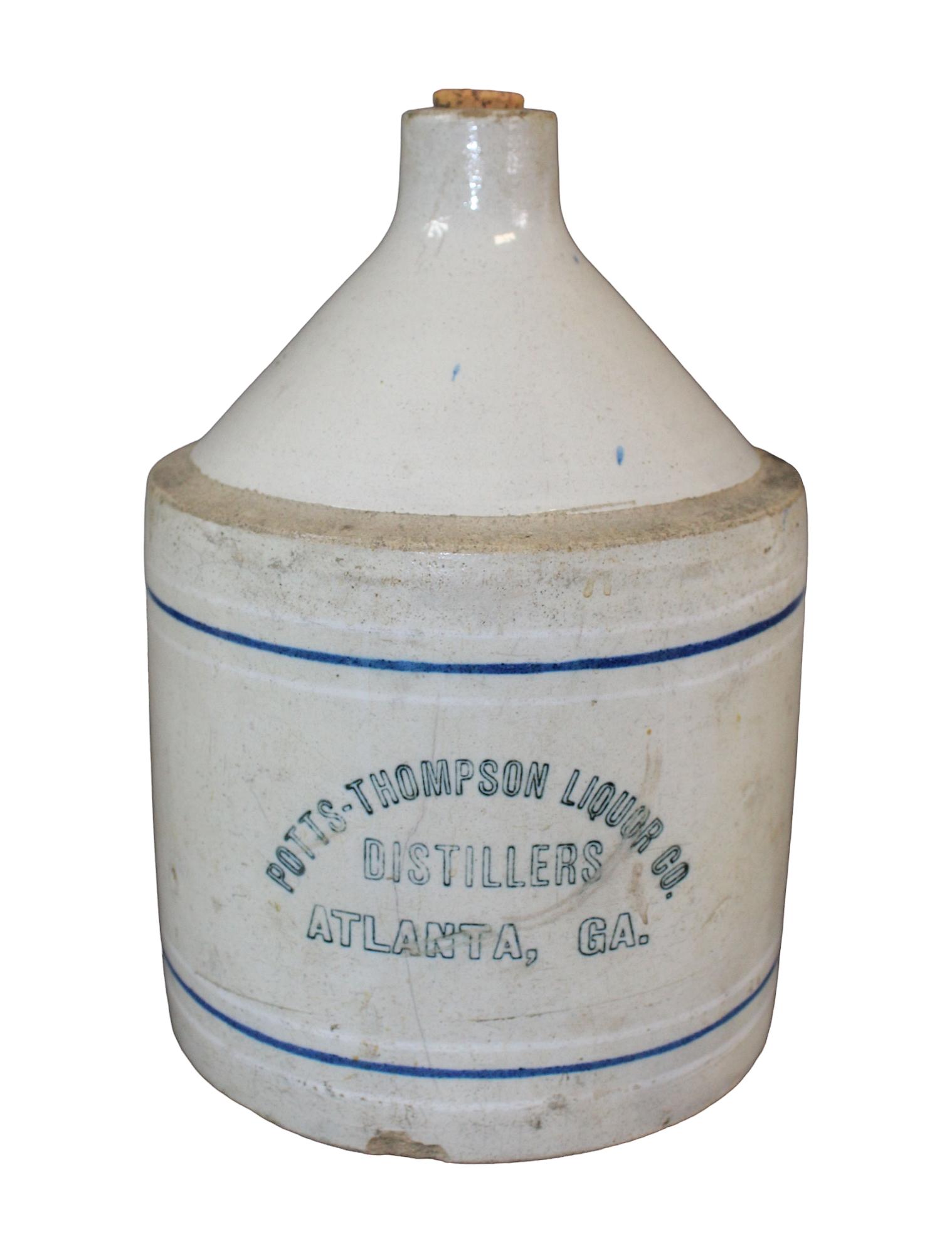 2 gallon stoneware crock: 2 gallon stoneware crock stamped Potts-Thompson Liquor Co. Distillers, Atlanta, GA 14" h x 9" diam