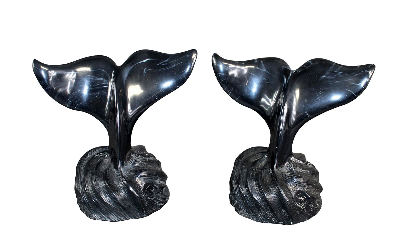 Cook Co. whale tail book ends: Cook Co. whale tail book ends 6 1/2" h x 7 1/4" w x 4 1/4" diam at base