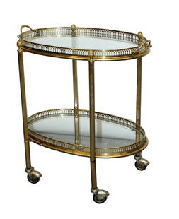 French oval brass and glass tea cart: French oval brass and glass tea cart. Mid 20th century. 23 1/2"h x 22"w x 14"d overall