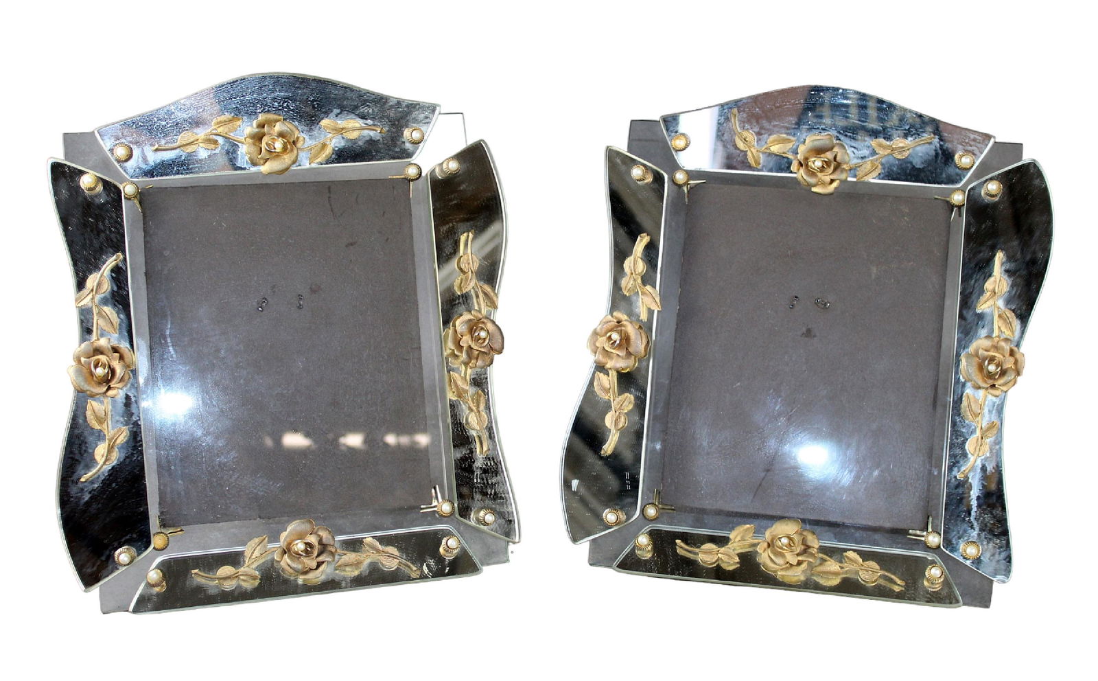 Pair of Venetian glass picture frames: Pair of Venetian glass picture frames with raised gilt metal flowers. Mid 20th century. Overall: 15 1/2" h x 13 1/2" w Sight size: 9 3/4" h x 8" w (approx)