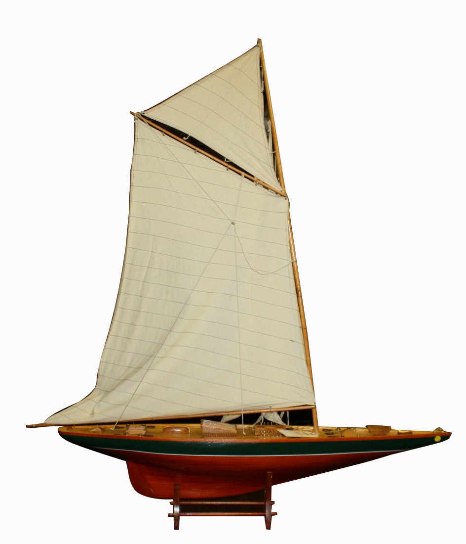 Hand made wooden model pond yacht with full linen: sails. On wooden stand. 58 1/2"h x 53"l x 8"d