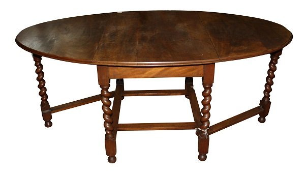 Mahogany oval drop side pub table with barley twist: legs. 29"h x 27 1/2-72"long x 42 1/2"w