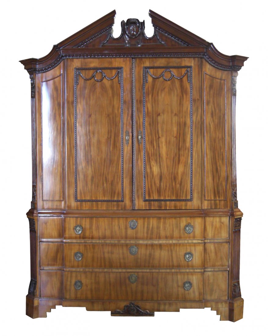 English 19th century mahogany linen press with: open pediment. Upper cabinet has 2 large doors with ribbon & wreath carving. Lower cabinet has 3 drawers on bracket plinth. 101 1/2"h x 72"l x 22 1/2"d