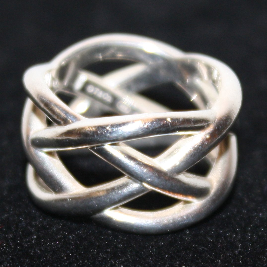 Tiffany & Co. sterling silver wide knot ring: with original Tiffany bag. Size 6