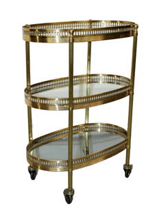 French 3 tier brass & glass rolling bar cart: French 3 tier brass & glass rolling bar cart. Mid 20th century. 23 1/4"h x 17"w x 10"d