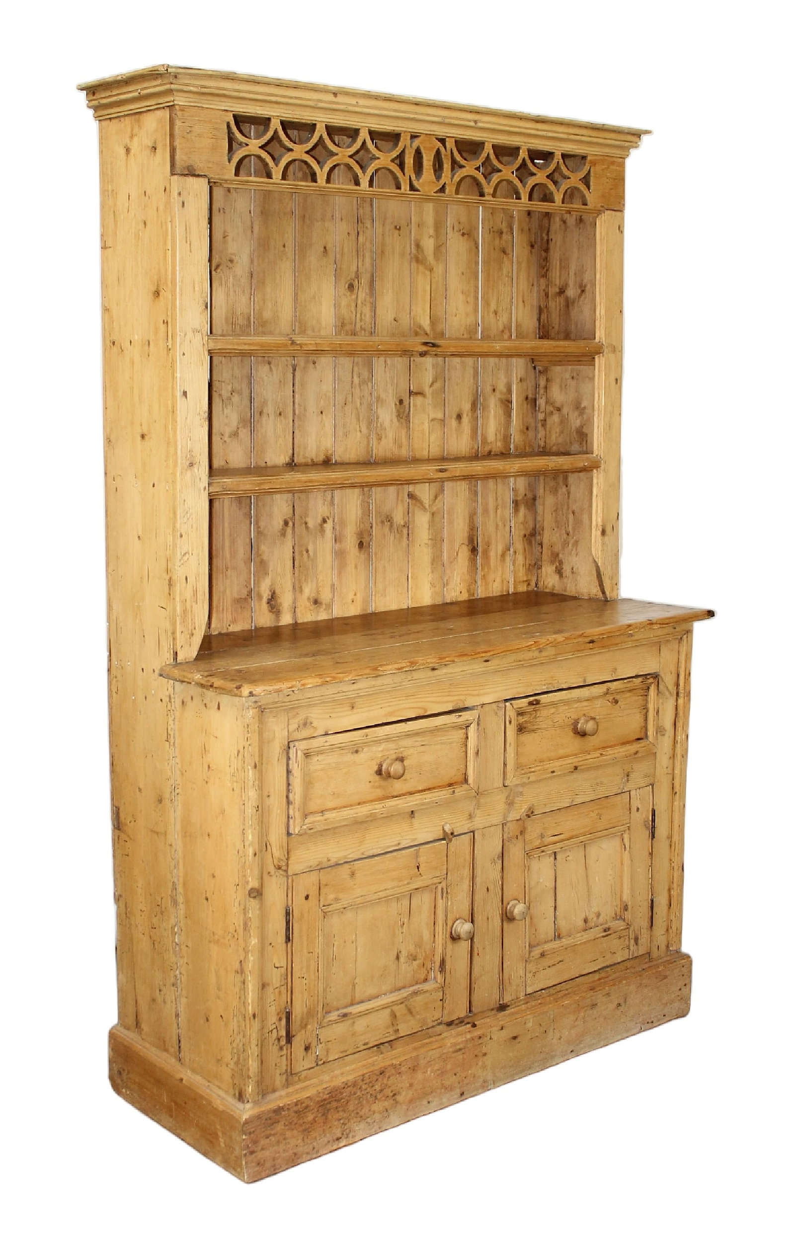 Irish pine buffet with hutch: Irish pine buffet with hutch. Lower cabinet with 2 drawers and 2 doors. Upper cabinet has open shelves. Early 20th century. 77"h x 49 1/2"w x 19 1/2"d