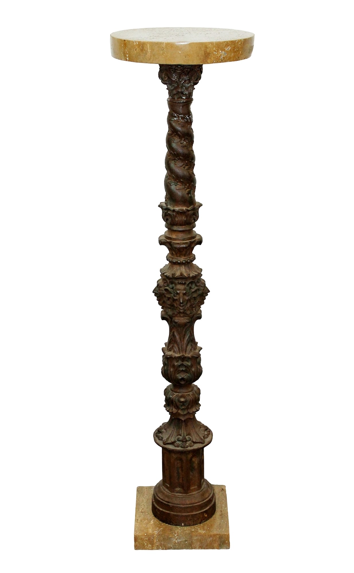 French cast iron twist pedestal with figural masks and marble top: French cast iron twist pedestal with figural masks, Corinthian capital and travertine marble top and base. Late 19th century. 42 1/2"h x 11 7/8" dia