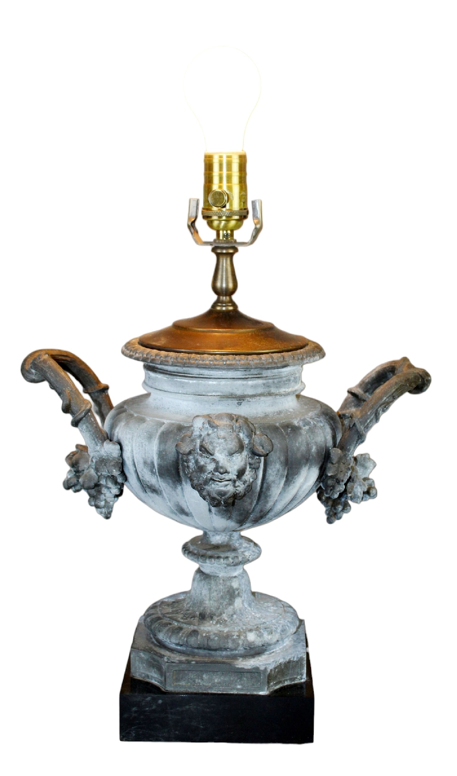 Classical urn form lamp with Bacchus masks: Classical urn form lamp with Bacchus masks. 18 1/2" H (w/o bulb) x 13" W x 9 3/4" D