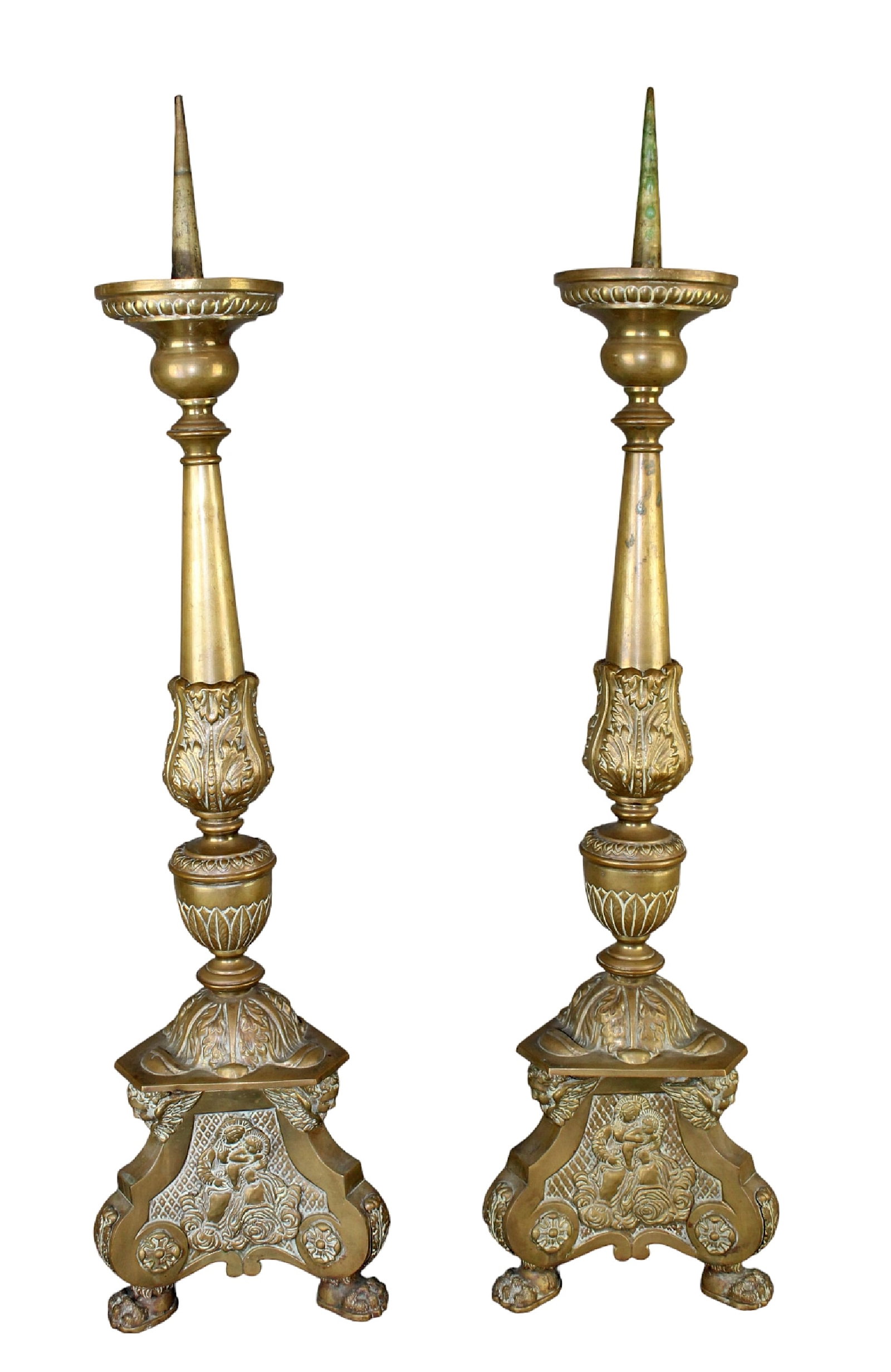 Pair of French embossed brass altar candlesticks: Pair of French embossed brass altar candlesticks with Madonna and Child, Lamb of God, cherubs and Sacred Heart of Jesus. Early 20th century. 28 3/4" H x 7 1/4" W x 6 1/2" D