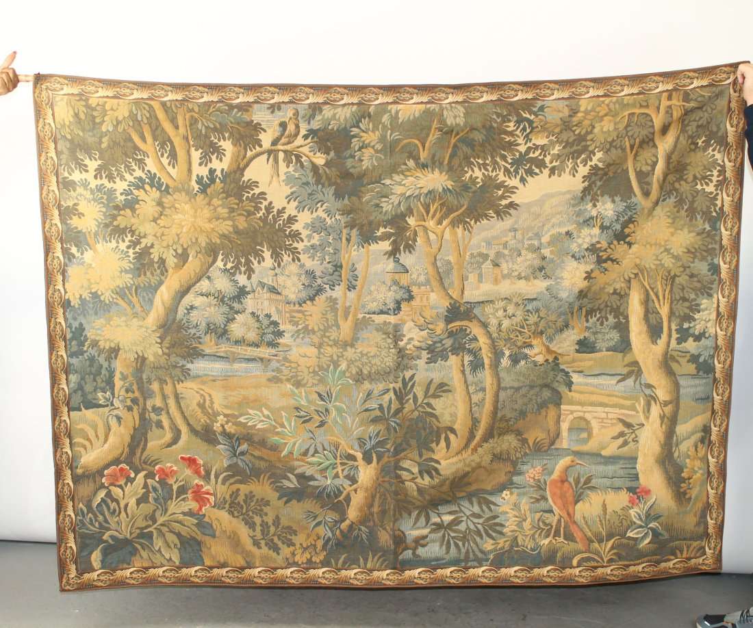 French machine woven verdure tapestry with village scene: French machine woven verdure tapestry with village scene. 57"h x 76"w