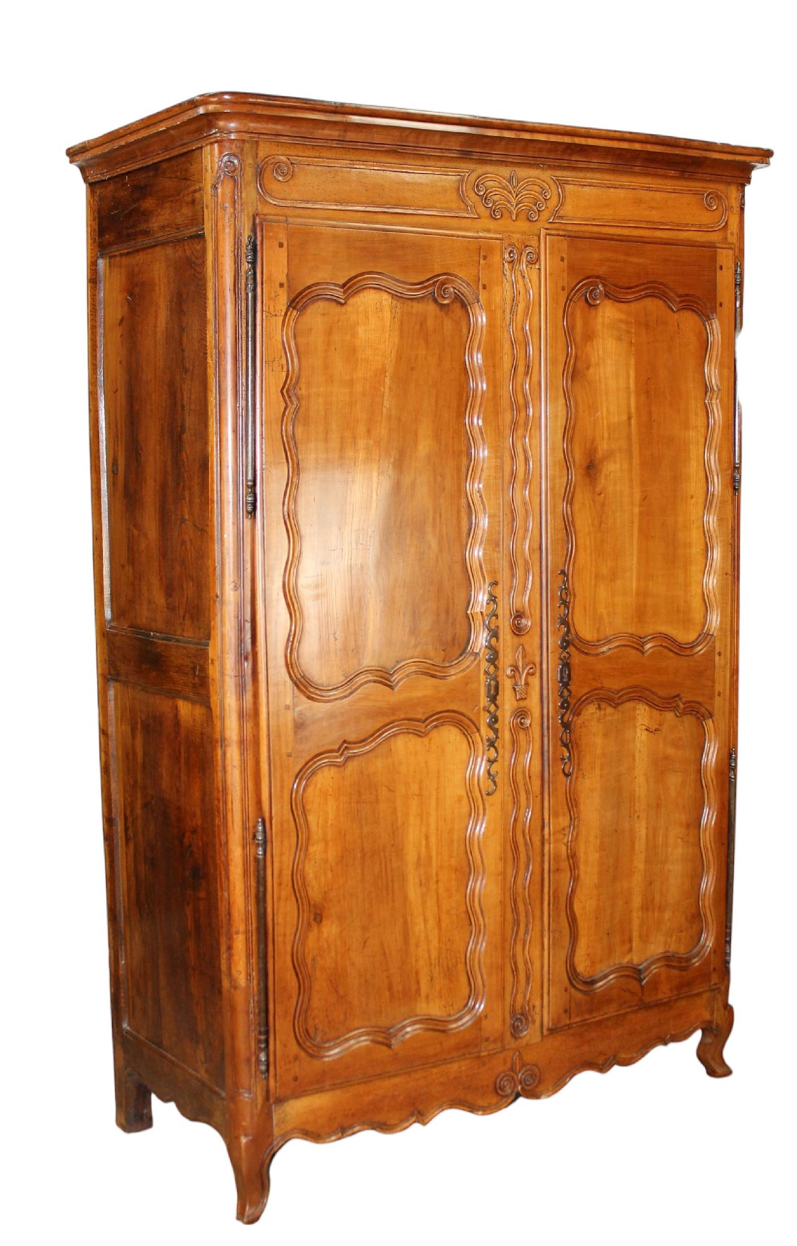 French 18th century armoire in mixed woods with carved fleur de lys (1 of 10)