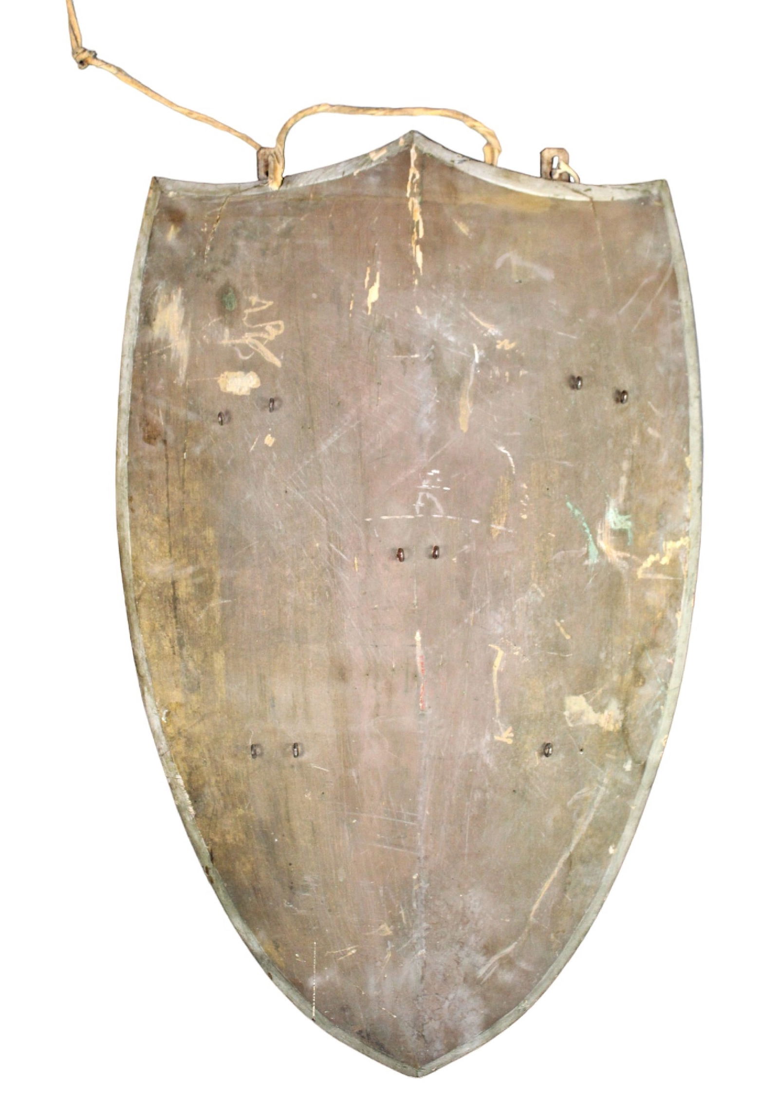 French shield form wooden crest: French shield form wooden crest. Early 20th century. 31 1/4"h x 19 1/2"w Weight: 12lbs