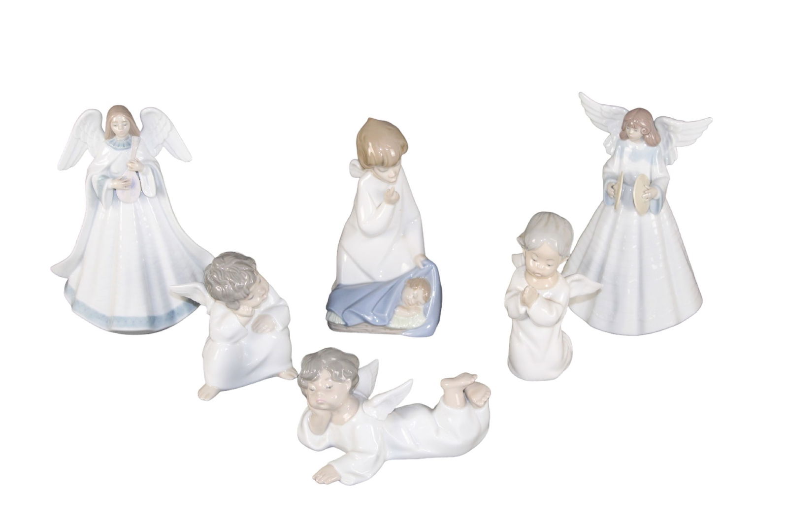 Lot of 6 Lladro angels: Lot of 6 Lladro angels. Made in Spain. Two original Lladro boxes included (for both taller angels with instruments). Sizes vary, range approx from 7 3/8"h x 4 3/4"w x 4 1/4"d to 4 1/8"h x 3 1/2"w x 3